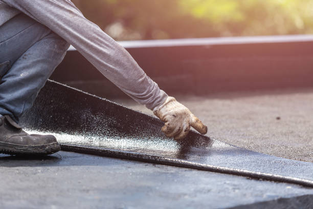 Professional Basement Waterproofing technician working in Boston, IN
